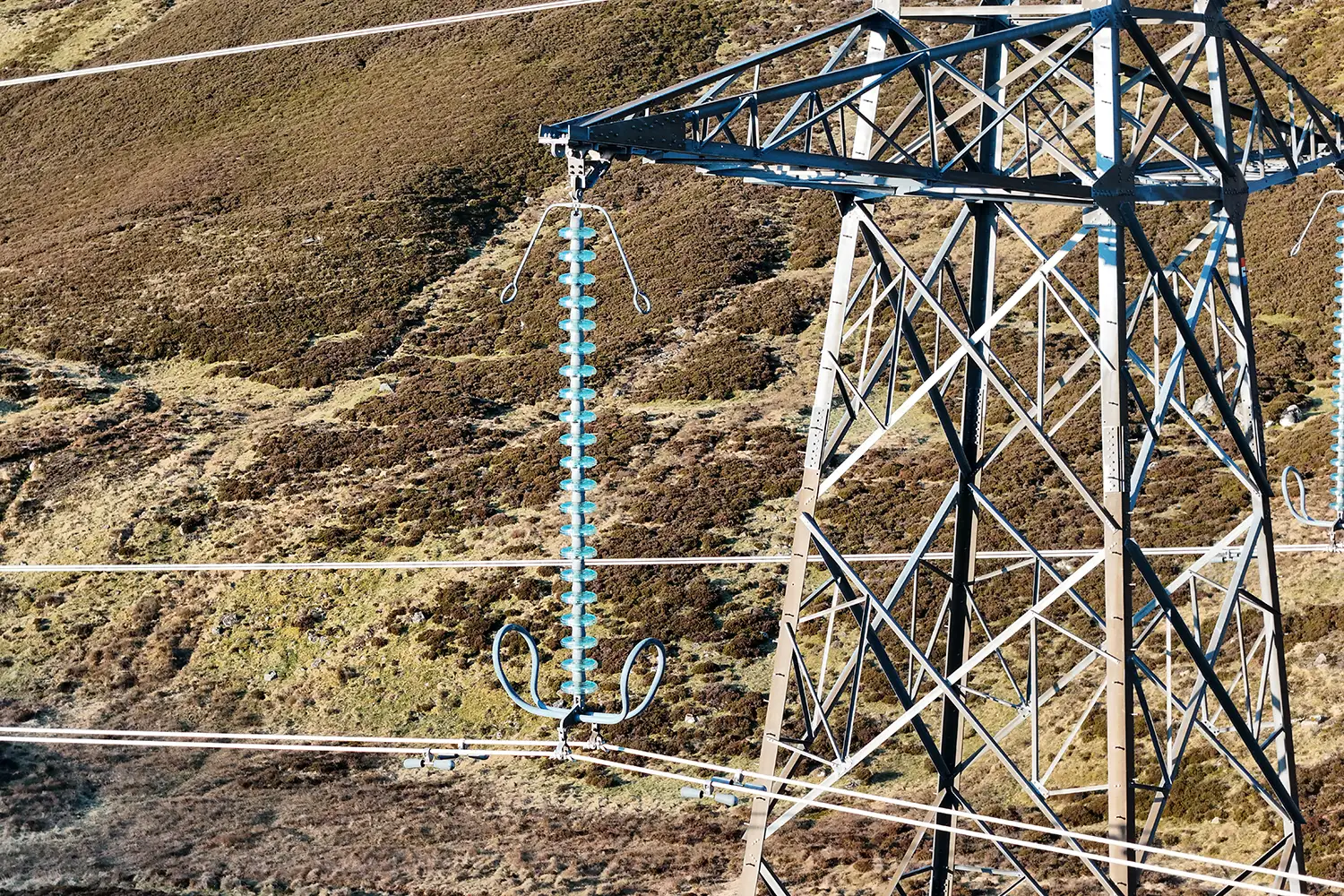 Drone inspecting transmission lines