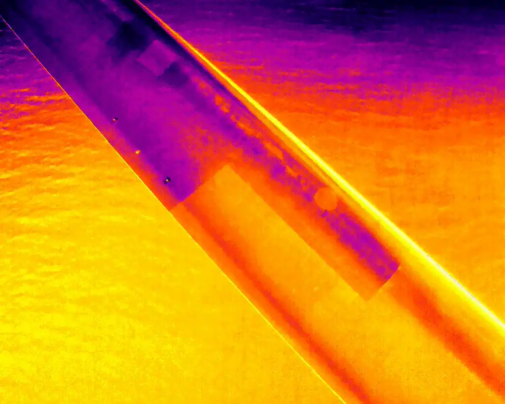 Wind turbine blade thermal inspection for apid fault finding for structural cracks, delamination, and kissing bonds using themography